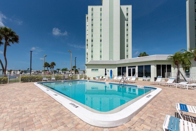 view of swimming pool with a patio area