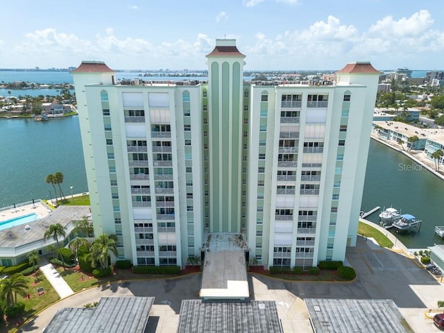 view of property with a water view