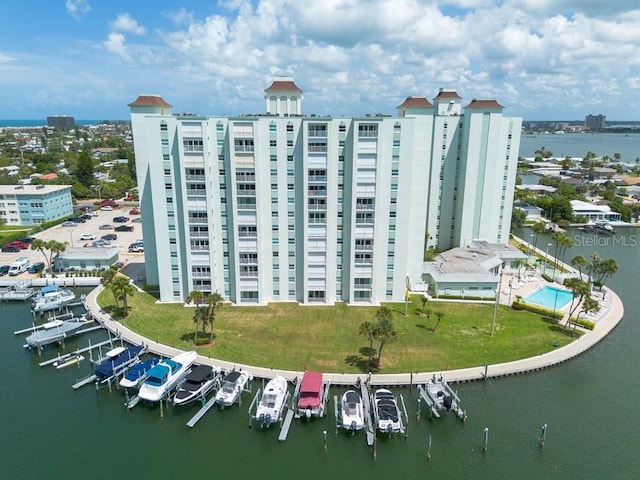 birds eye view of property with a water view