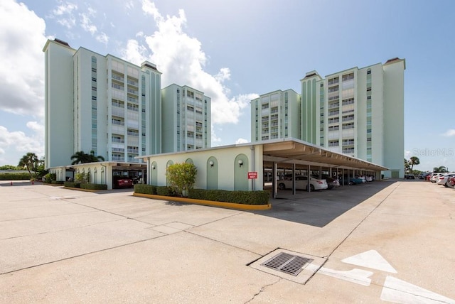 view of building exterior featuring a carport