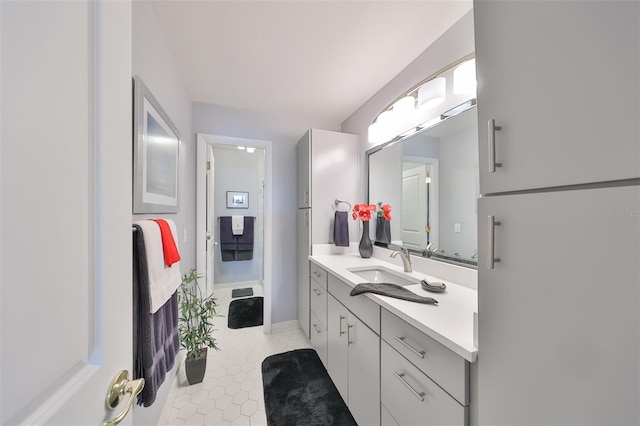 bathroom featuring vanity and tile patterned flooring