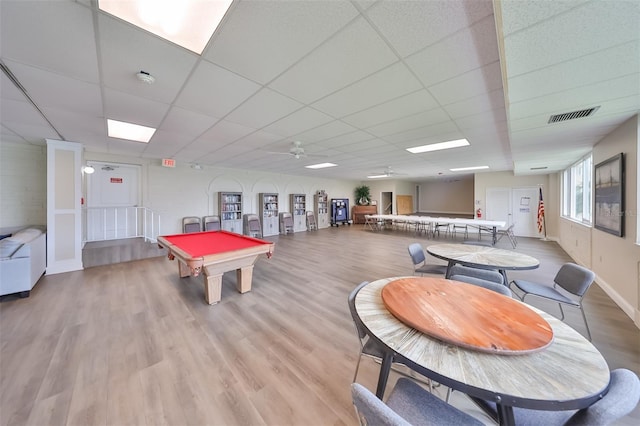 rec room featuring billiards, a paneled ceiling, light hardwood / wood-style floors, and ceiling fan