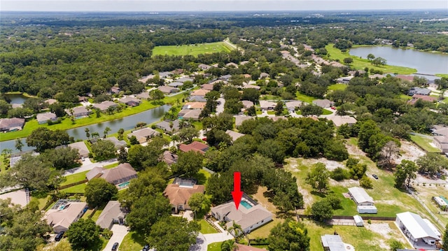 drone / aerial view with a water view