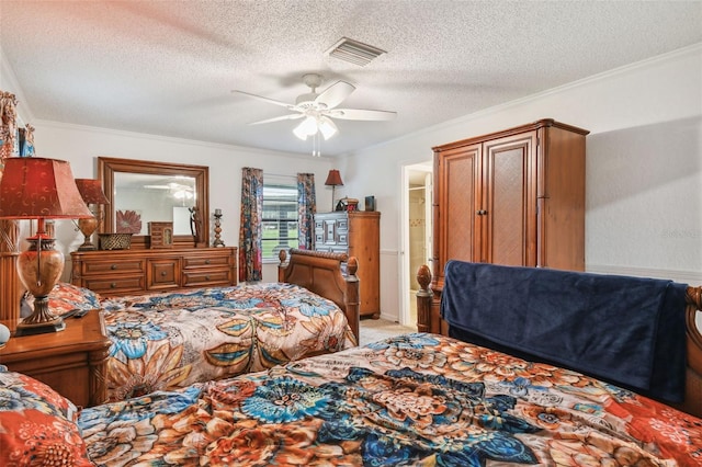 carpeted bedroom featuring a textured ceiling, ceiling fan, and ornamental molding