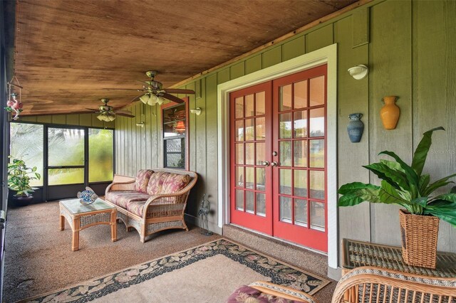 entrance to property with french doors and ceiling fan