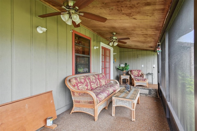 sunroom featuring ceiling fan, vaulted ceiling, and wooden ceiling