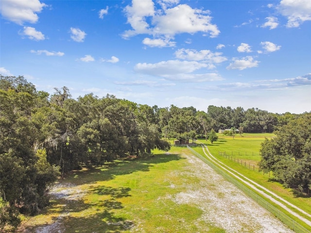 birds eye view of property with a rural view