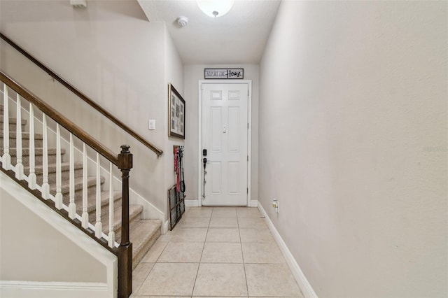 view of tiled entrance foyer