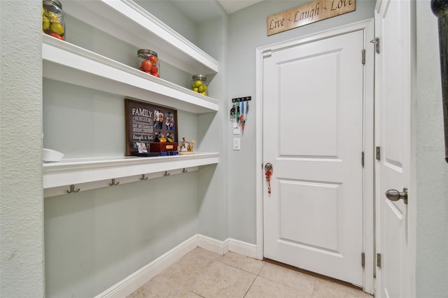 doorway featuring light tile patterned floors