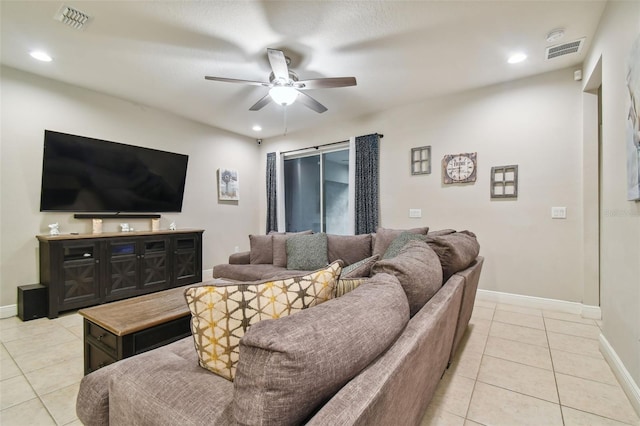 tiled living room featuring ceiling fan