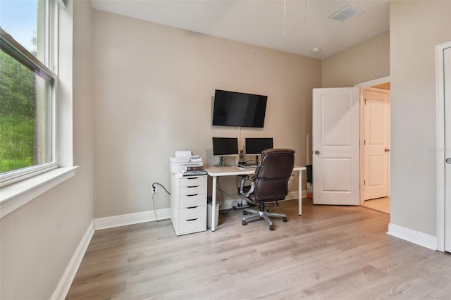 office space featuring light hardwood / wood-style floors