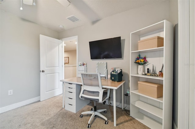 view of carpeted office space