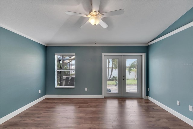 interior space with lofted ceiling, dark wood-type flooring, a wealth of natural light, and french doors