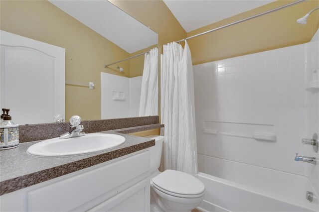 full bathroom with vanity, toilet, and shower / bath combo