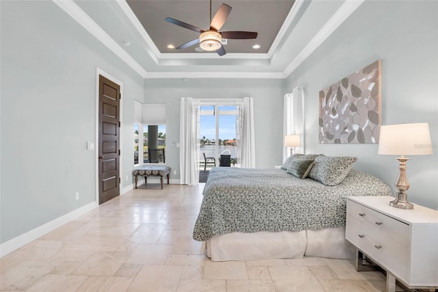 bedroom with ornamental molding, a tray ceiling, a towering ceiling, ceiling fan, and access to exterior