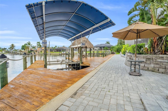 dock area with a water view