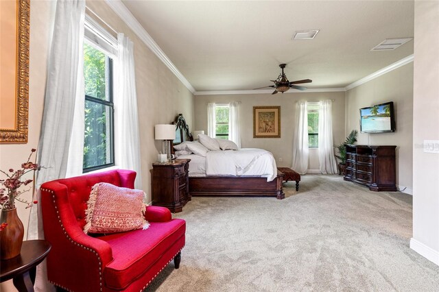 bedroom featuring carpet floors, multiple windows, and ceiling fan