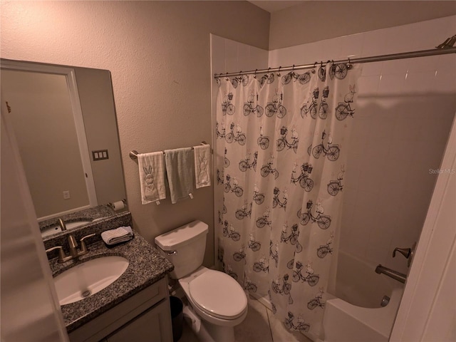 full bathroom featuring toilet, shower / tub combo with curtain, and vanity