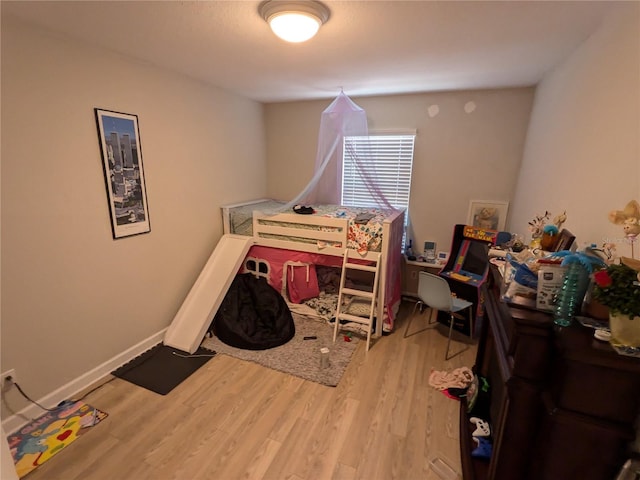 bedroom featuring hardwood / wood-style floors