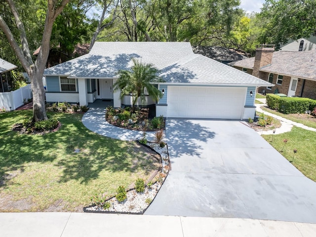 ranch-style house with a garage and a front yard