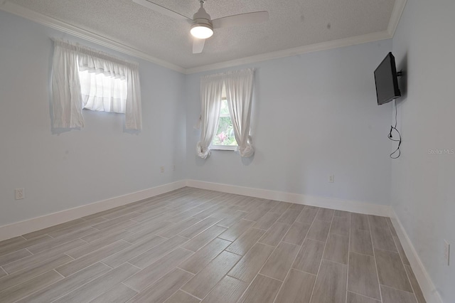 unfurnished room featuring light hardwood / wood-style flooring, a textured ceiling, ceiling fan, and ornamental molding