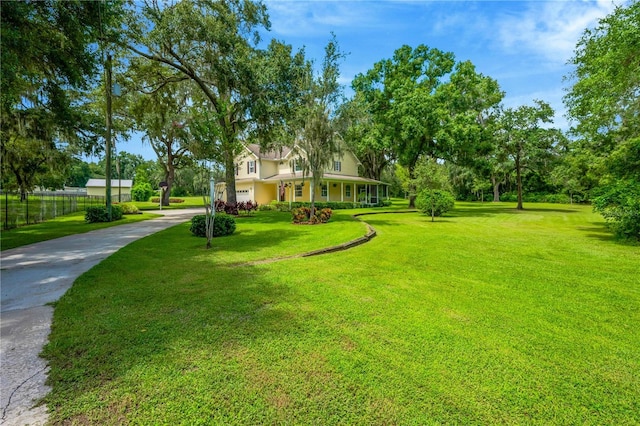 view of yard featuring a porch