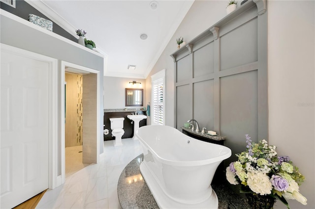 bathroom featuring independent shower and bath, vaulted ceiling, a bidet, and crown molding