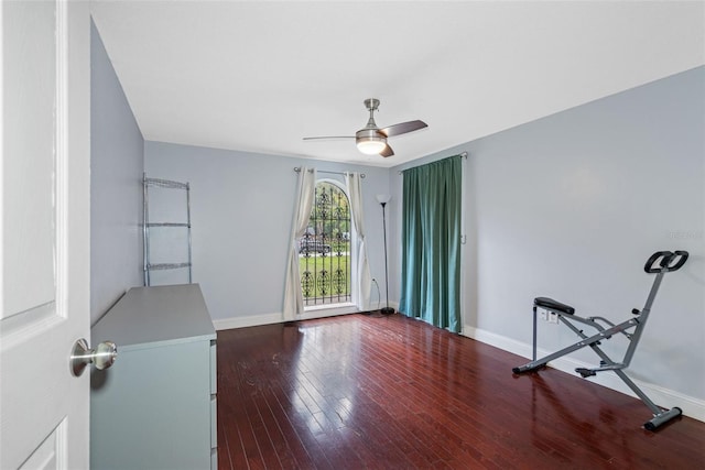 spare room with hardwood / wood-style floors and ceiling fan