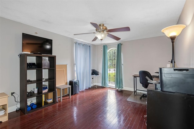 office space with ceiling fan and dark hardwood / wood-style floors