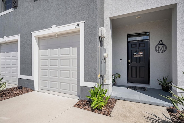 entrance to property with a garage