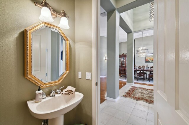 bathroom featuring sink and hardwood / wood-style flooring