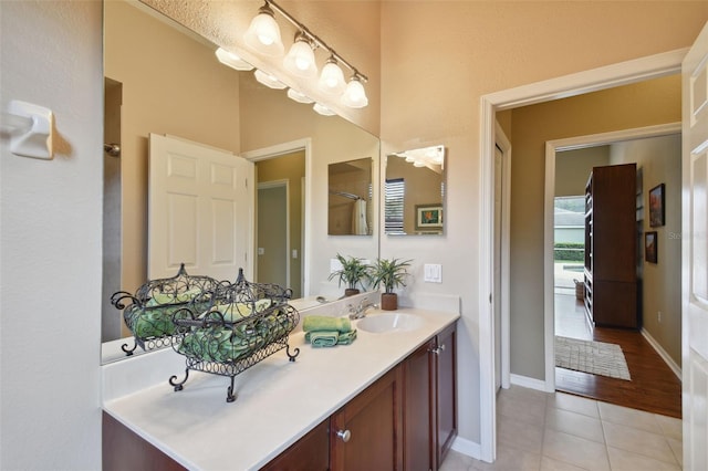 bathroom featuring hardwood / wood-style floors and vanity