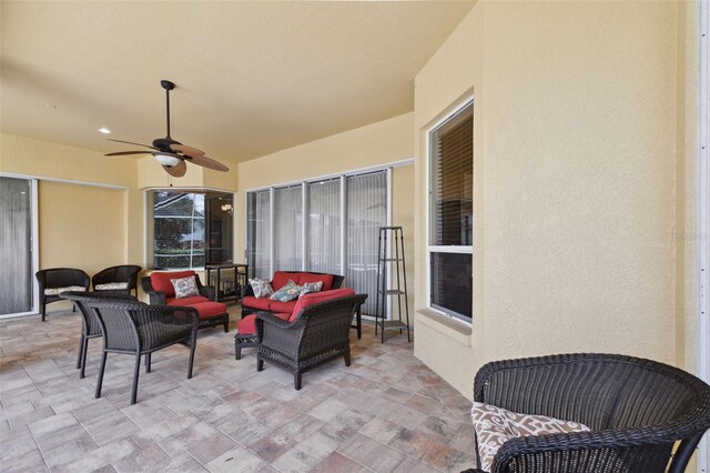 view of patio / terrace featuring ceiling fan and an outdoor hangout area