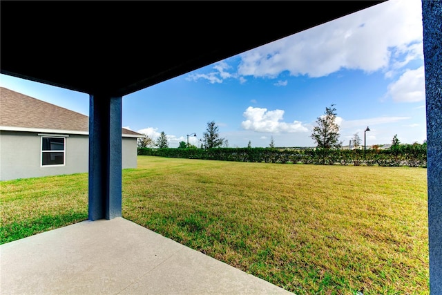 view of yard with a patio area