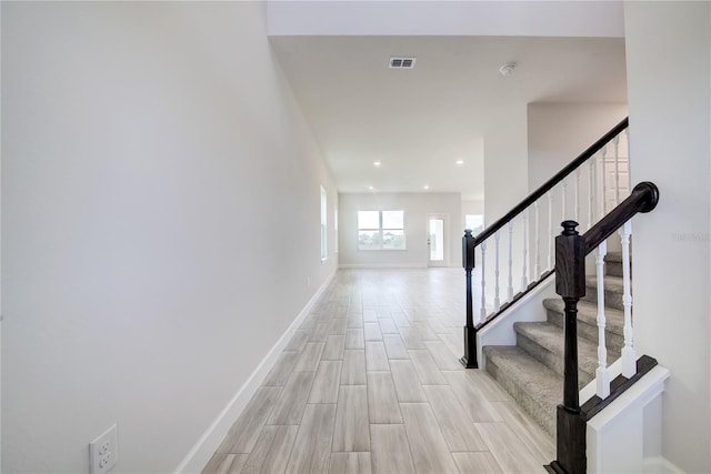 entrance foyer featuring light hardwood / wood-style floors