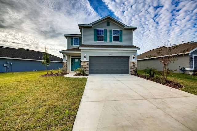 view of front of house featuring a garage and a front yard