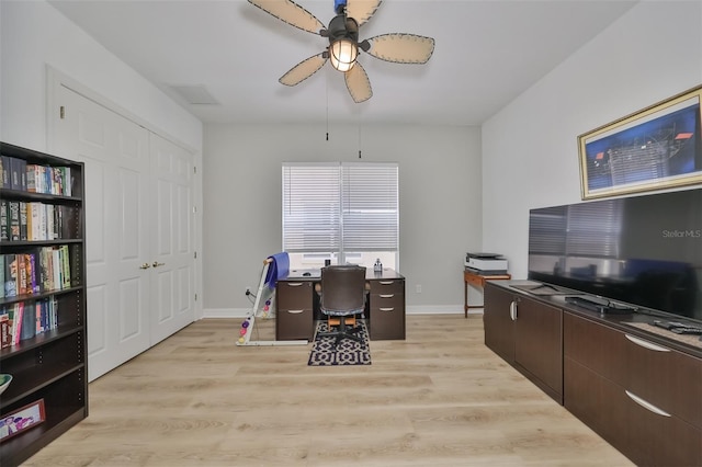 office area with ceiling fan and light hardwood / wood-style flooring