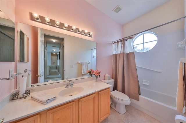 full bathroom featuring tile patterned flooring, vanity, toilet, and shower / bath combo with shower curtain