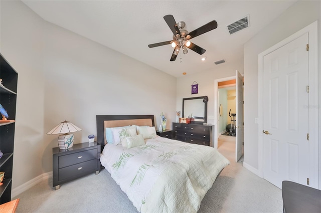 bedroom with light colored carpet and ceiling fan