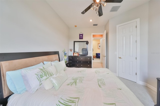 bedroom with light colored carpet and ceiling fan