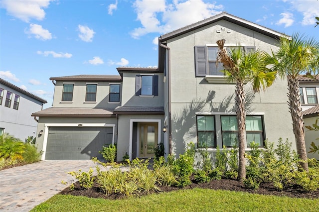 view of front of home with a garage