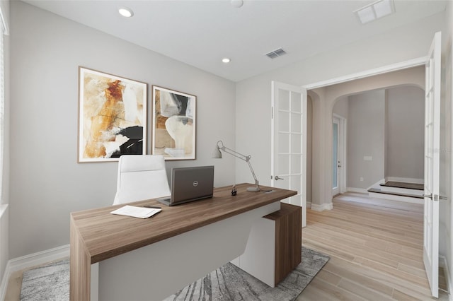 office area with light wood-type flooring