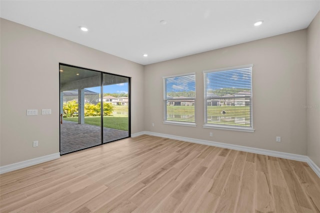 empty room with light wood-type flooring