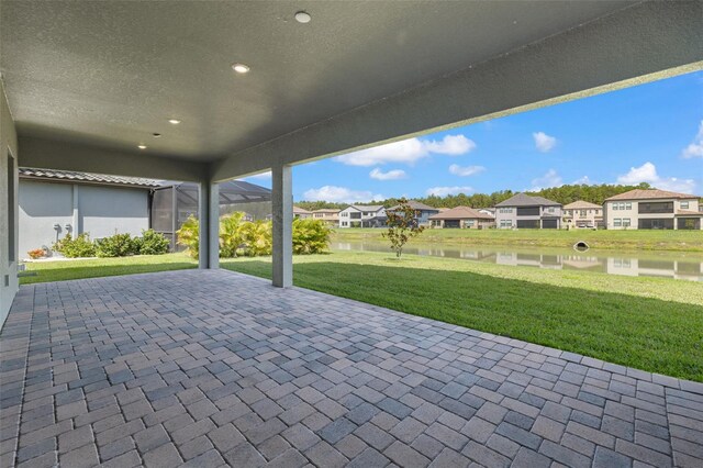 view of patio / terrace with a water view