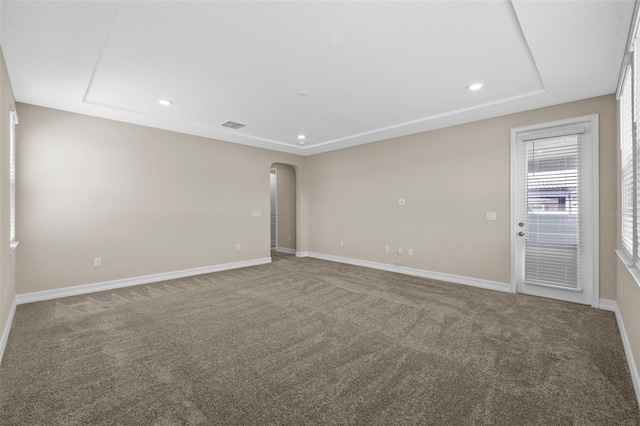 empty room with carpet flooring