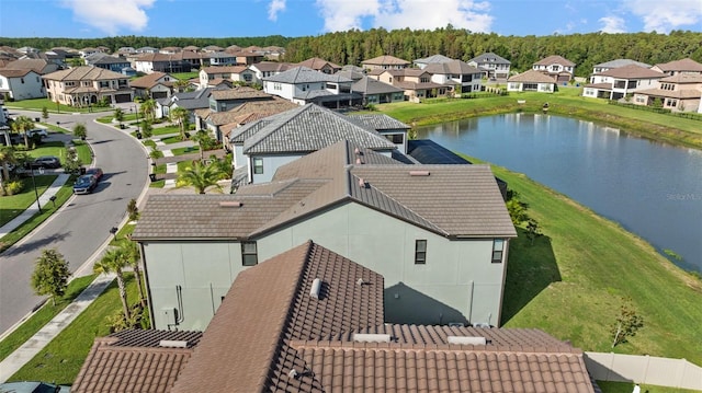 drone / aerial view with a water view