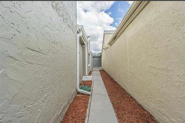 view of home's exterior with stucco siding