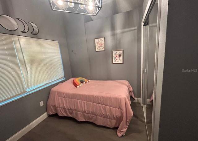 bedroom featuring a chandelier