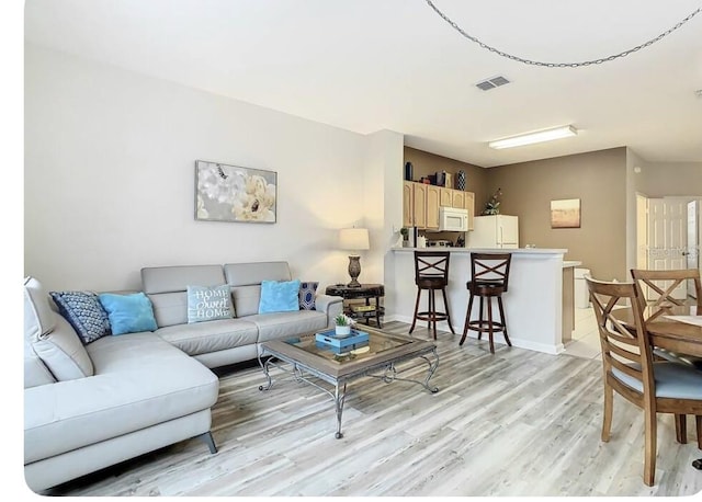 living room featuring light hardwood / wood-style floors