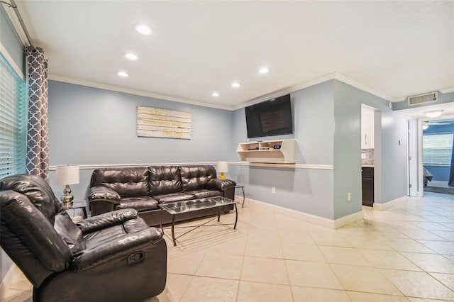 tiled living room featuring crown molding